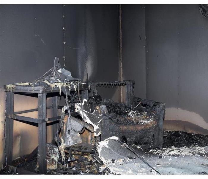 chair and furniture in the room after burned by fire